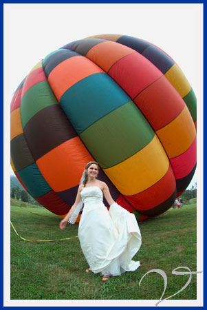 Bride in front of an Asheville hot air balloon.