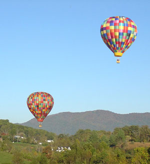 Two Asheville Hot Air Balloons with MTS in background